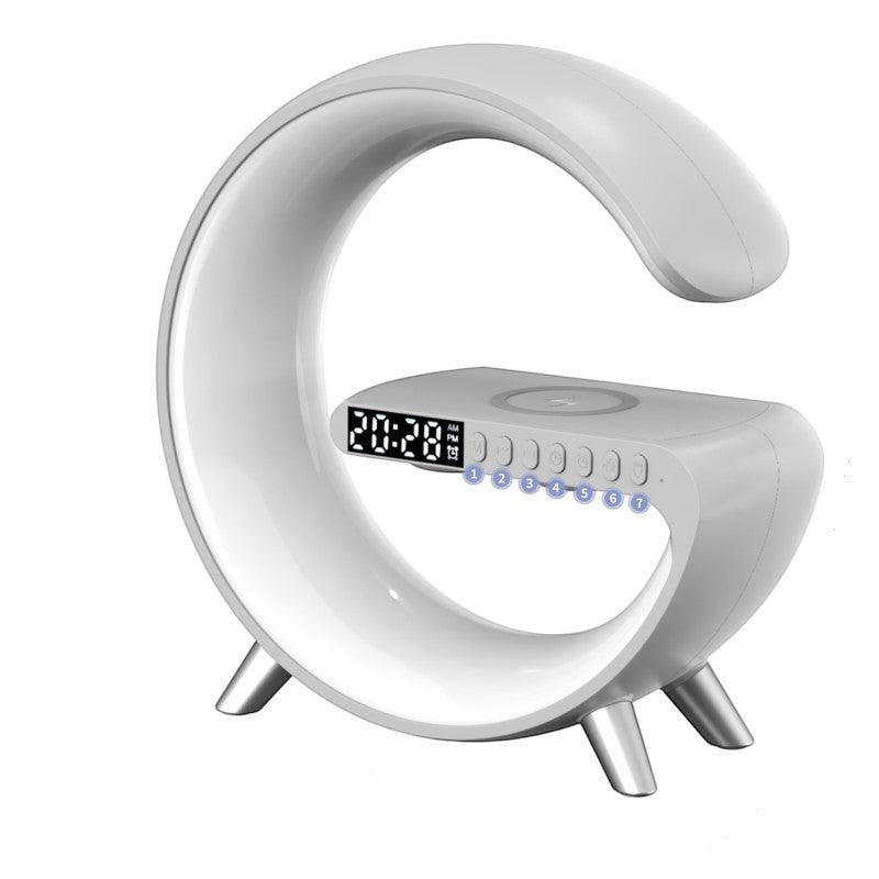 DRAVEQ G-shape atmosphere lamp in white with integrated digital clock, wireless charger, and Bluetooth speaker base.
