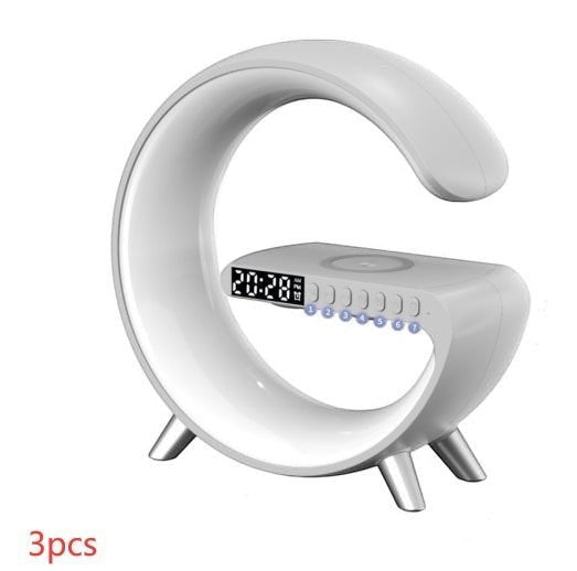 DRAVEQ white G-shape atmosphere lamp with digital clock, wireless charging pad, and integrated Bluetooth speaker