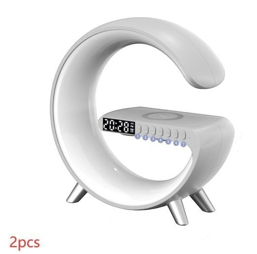 DRAVEQ white G-shape atmosphere lamp with digital clock, wireless charging pad, and integrated Bluetooth speaker